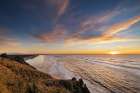 Sunset clouds over Benson Beach at Cape Disappointment State Park in Washington State, USA Art Print